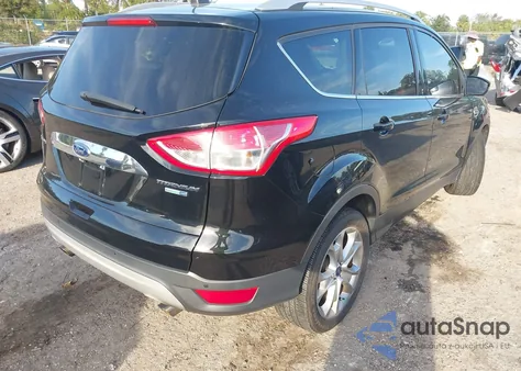 2016 Ford Escape Titanium z USA, uszkodzony, nr VIN 1FMCU9J97GUA77921